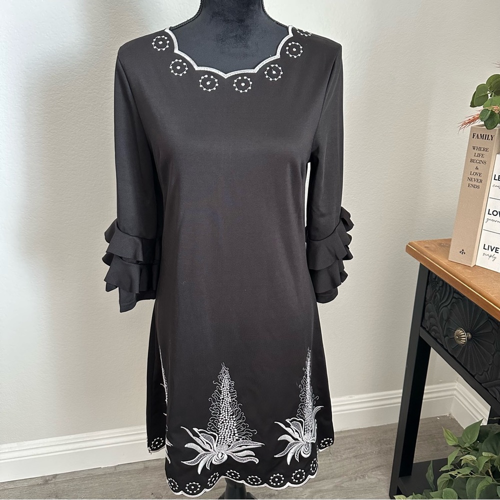 Elegant Black Dress with Intricate White Embroidery and Ruffle Sleeves Zip Back